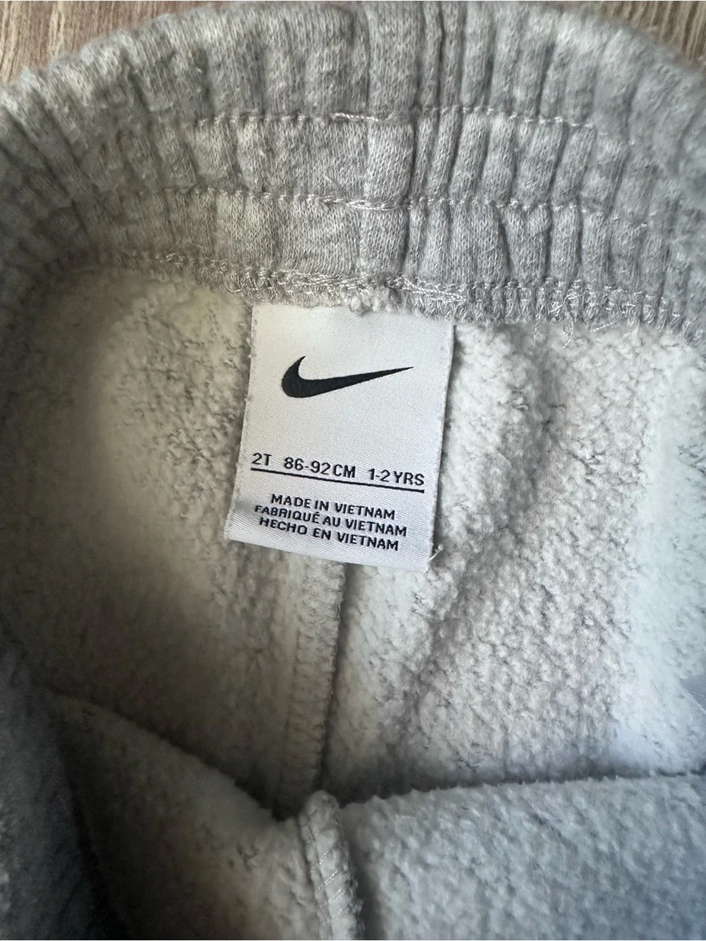 Nike Light Gray Kids Sweatpants with Black Swoosh